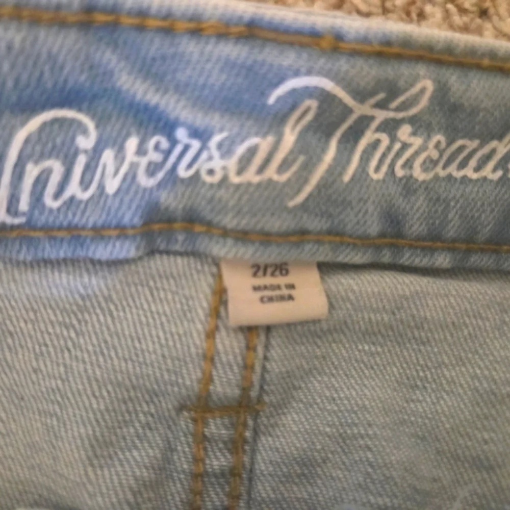 Light Blue Denim Skirt with Frayed Hem